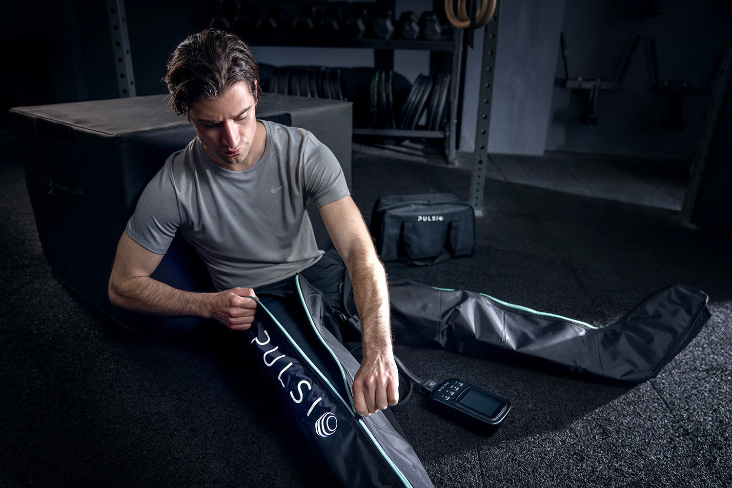 Leg compression sleeves with a massage gun, showing a £149.99 savings offer.