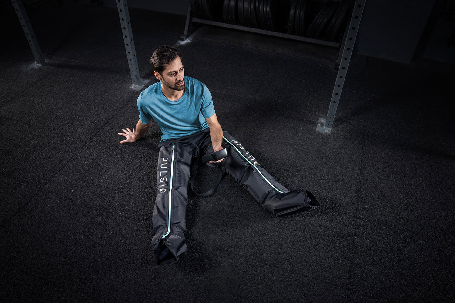 Leg compression sleeves with a massage gun, showing a £149.99 savings offer.